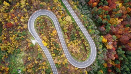 road in autumn scenery - aerial shot