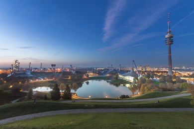 olympic park with olympic tower at night, munich, germany