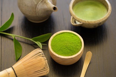 set of matcha powder bowl wooden spoon and whisk green tea leaf organic green matcha tea ceremony.