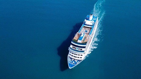 large cruise ship sailing across the mediterranean sea - aerial image