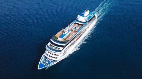 large cruise ship sailing across the mediterranean sea - aerial image