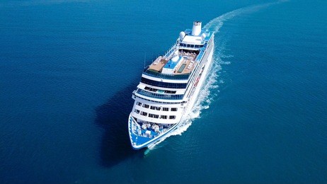 large cruise ship sailing across the mediterranean sea - aerial image