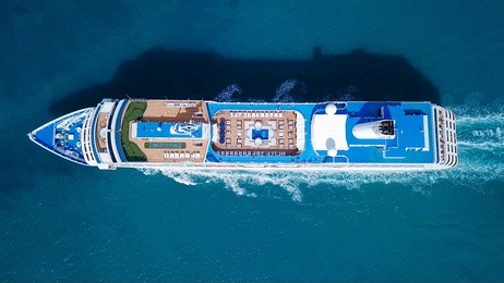 large cruise ship sailing across the mediterranean sea - aerial image