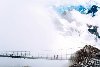 view of beautifultitlis mountain cliff in switzerland. the highest suspension bridge in europe.
