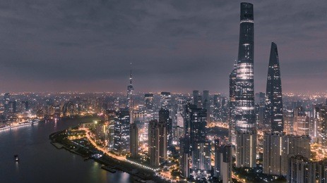 aerial view of skyscrapers at night in shanghai city