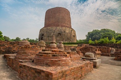 dhamekh stupa with archaeological ruins at sarnath, varanasi, india