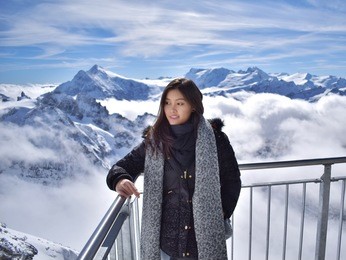 a woman at the top of mt.titlis, engelburg, switzerland  