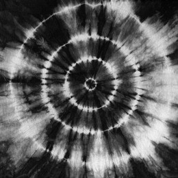 abstract tie dyed fabric of black and white color on white cotton. hand painted fabrics. shibori dyeing