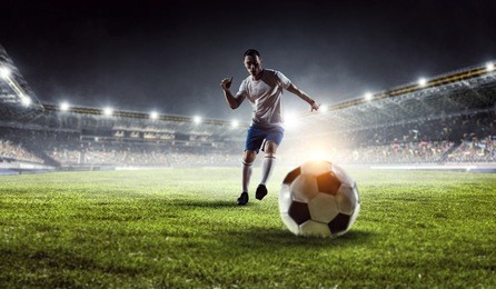 soccer player at stadium. mixed media