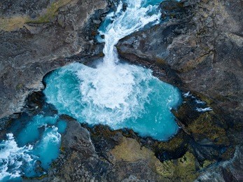 aldeyjarfoss is an amazing waterfall in northern iceland. aerial photography captured by drone..