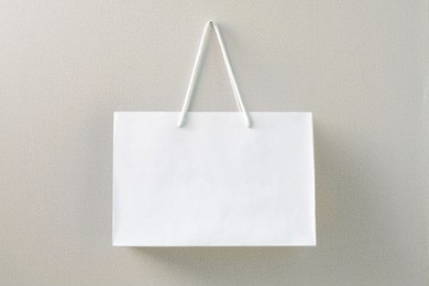 mock up of white paper bag, blank craft package 