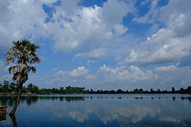 srah srang reservoir dating from the 12th century in verdant surrounds known for sweeping sunrise views.