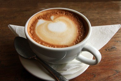 coffee, milk froth, wooden table