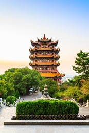 yellow crane tower in the evening, the traditional chinese multi-storey tower located on sheshan (snake hill) in wuhan, hubei, china