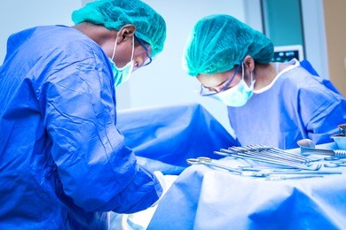 surgical team performing surgery operation. doctor performing surgery .