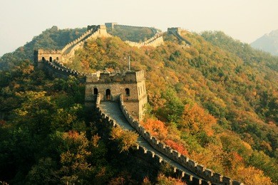 wall in autumn
china, beijing: great wall in autumn. the section of the wall is mutianyu. the wall passes along the crests of the hills, covered with wood.