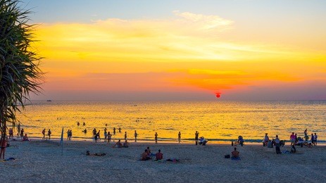 sunset on a tropical beach. kata, phuket island, thailand. 