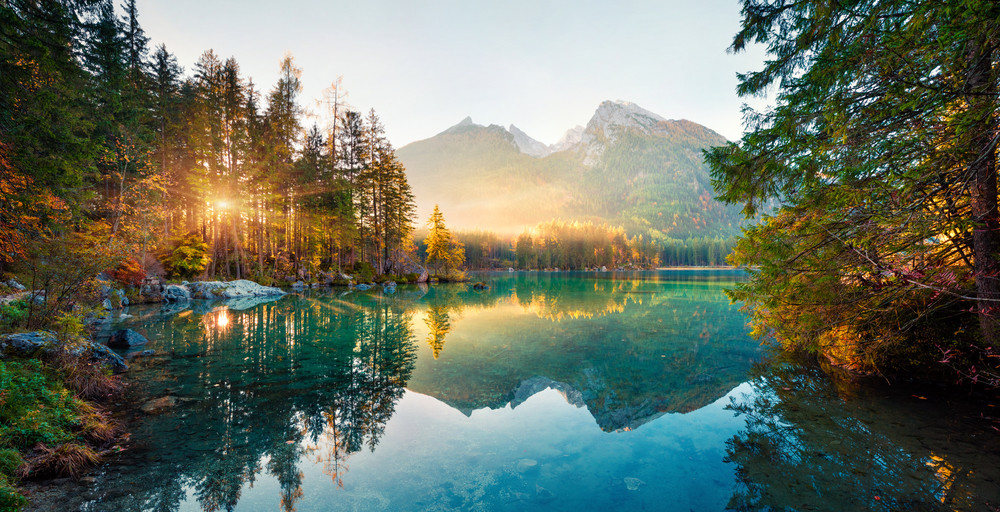 amazing autumn sunrise of hintersee lake. picturesque morning view of bavarian alps on the austrian border, germany, europe. beauty of nature concept background.
