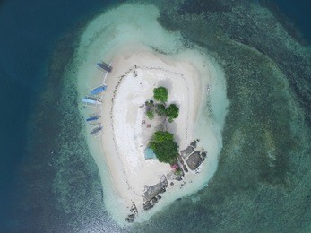 nice view from top small island call gili kedis located at lombok island indonesia capture by drone
