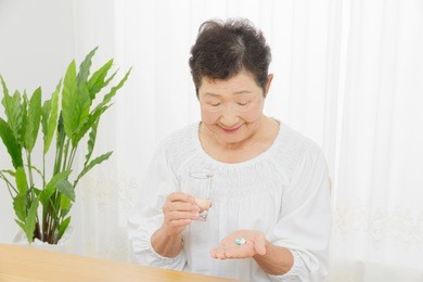 asian woman having the medicine