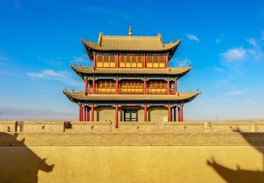 the pass tower above the west entrance gate into the jiayuguan fortress, which is the westernmost ming great wall garrison in the great wall of china 