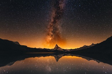 milky way at lake stellisee matterhorn  , zermatt , switzerland.