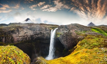 panoramic view of beautiful waterfall on the disco island, western greenland