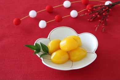 tasty candied chestnuts on a plate  with japanese new year decoration