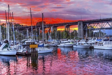 sunset granville island burrard street bridge yachts apartment buildings vancouver british columbia canada
