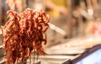 squid skewers,halal street food in muslim quarter, xi'an, china