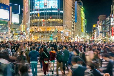 pedestrians crosswalk at shibuya district in tokyo, japan