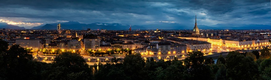 torino (turin), panoramic night view of piazza vittorio veneto with mole antonelliana