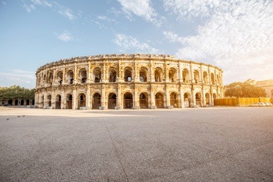 morning view on the ancient roman amphitheatre in nimes city in the occitanie region of southern france