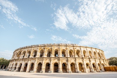 morning view on the ancient roman amphitheatre in nimes city in the occitanie region of southern france