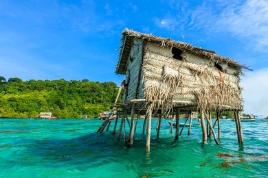 beautiful landscapes view borneo sea gypsy water village in bodgaya mabul island, semporna sabah, malaysia.