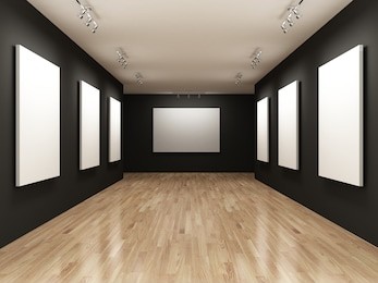white canvas on the walls of the gallery