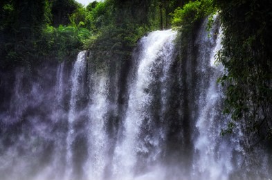 waterfall on the siem reap river. phnom kulen - the sacred mountain in cambodia, the top of the mountain is the sacred place for hindus and buddhists. cambodia, near angkor, phnom kulen national park