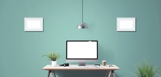 computer display and office tools on desk. desktop computer screen isolated. modern creative workspace background. front view.