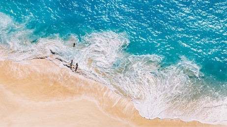 aerial view to tropical sandy beach and blue ocean