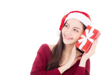 happy asian woman with smile holding gift box of xmas, present girl with celebration christmas a holiday, girl with buyer isolated on white background, shopping with season concept.