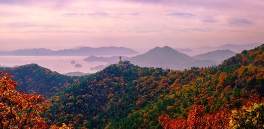 bohyunsa temple in goseong city, south korea. aerial view in autumn season. image contains noise and film grain. panorama view.