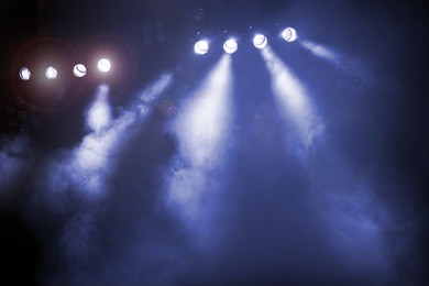 the concert on stage background with flood lights
