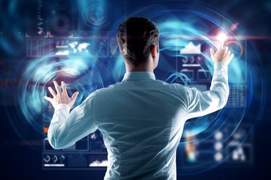 back view of young man using abstract digital business interface. infograph and analytics concept. double exposure 