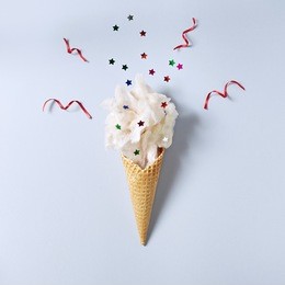 ice cream cone with cotton candy. minimal holiday concept. flat lay