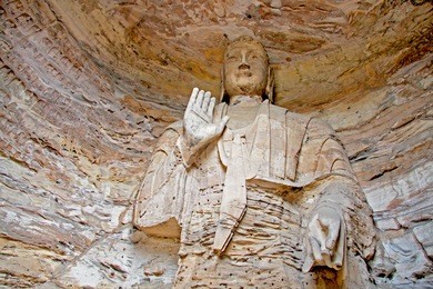 buddha statue : yungang grottoe, datong ; shanxi china. selective focus.