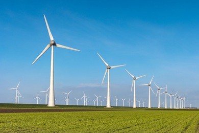 offshore windmill farm in the ocean  westermeerwind park , windmills isolated at sea on a beautiful bright day netherlands flevoland noordoostpolder
