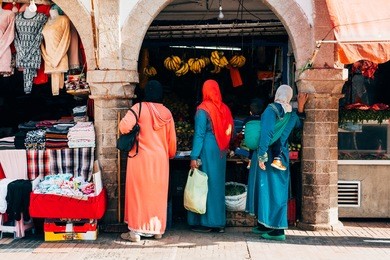moroccan womans shopping at market, marrakech
