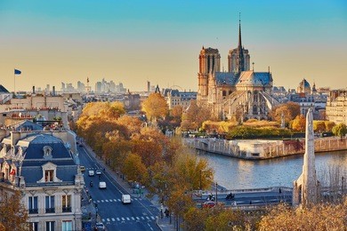 aerial panoramic cityscape view of paris, france with notre-dame cathedral and river seine on a fall day