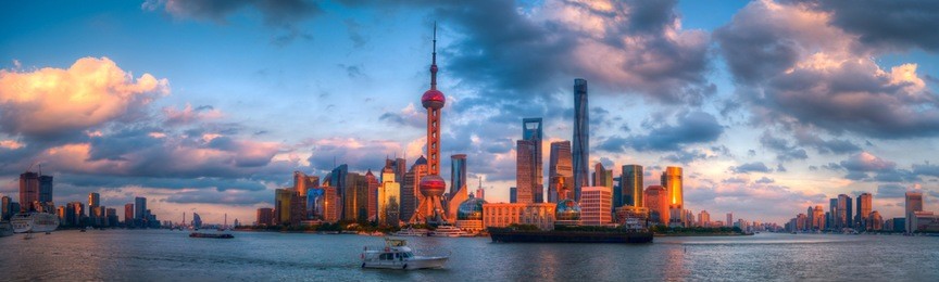 panorama of skyline of lujiazui in shanghai city at sunset