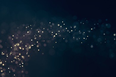 glitter lights abstract background. defocused bokeh dark illustration